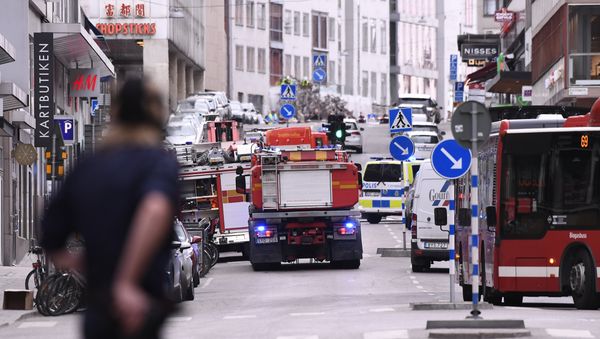 Emergency servies work at the scene where a truck crashed into the Ahlens department store at Drottninggatan in central Stockholm Emergency servies work at the scene where a truck crashed into the Ahlens department store at Drottninggatan in central Stockholm - Sputnik International