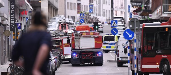 Emergency servies work at the scene where a truck crashed into the Ahlens department store at Drottninggatan in central Stockholm - Sputnik International