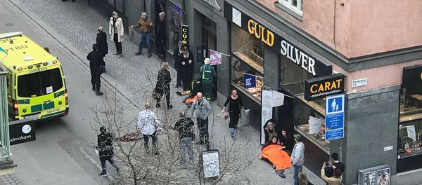 Ambulance in a street near the site were a truck was driven into a crowd in central Stockholm, Sweden Ambulance in a street near the site were a truck was driven into a crowd in central Stockholm, Sweden - Sputnik International