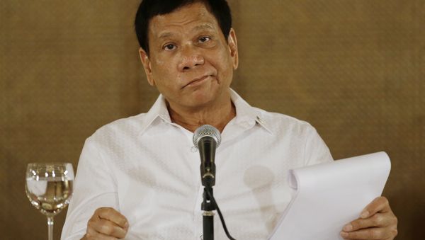 In this Monday, March 13, 2017 file photo, Philippine President Rodrigo Duterte reacts during a press conference at the Malacanang presidential palace in Manila, Philippines. - Sputnik International
