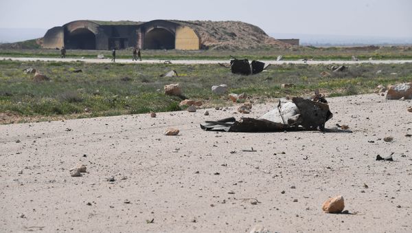 The aftermath of a US missile strike at the Shayrat military field in Syria - Sputnik International