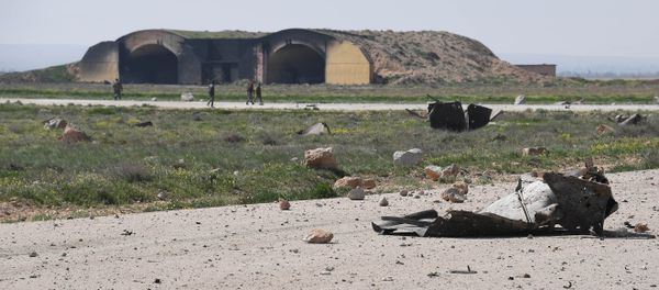 The aftermath of a US missile strike at the Shayrat military field in Syria - Sputnik International