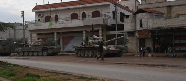 Armored vehicles in a village in the north of Hama, Syria - Sputnik International