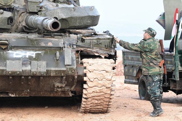 Syrian army troops during an assault on the city of Halfaya in the north of the Hama Governorate - Sputnik International