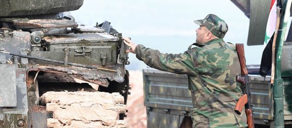 Syrian army troops during an assault on the city of Halfaya in the north of the Hama Governorate Syrian army troops during an assault on the city of Halfaya in the north of the Hama Governorate - Sputnik International
