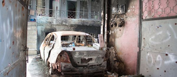Burned car in Mosul Burned car in Mosul - Sputnik International