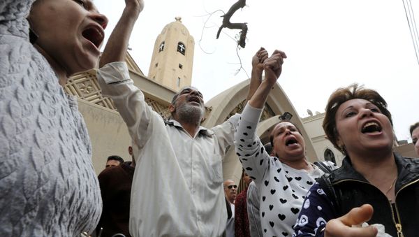 Relatives of victims react in front of a Coptic church that was bombed on Sunday in Tanta, Egypt, April 9, 2017 Relatives of victims react in front of a Coptic church that was bombed on Sunday in Tanta, Egypt, April 9, 2017 - Sputnik International