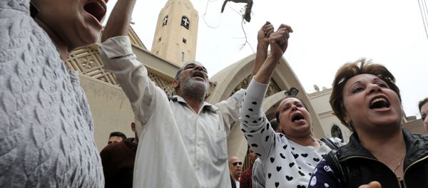 Relatives of victims react in front of a Coptic church that was bombed on Sunday in Tanta, Egypt, April 9, 2017 - Sputnik International