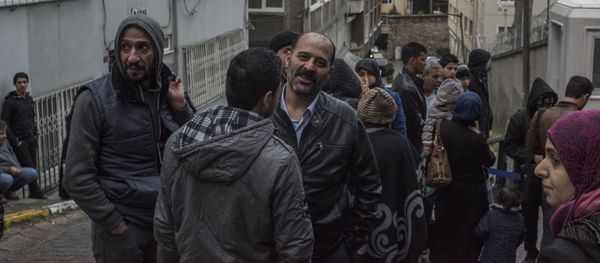 Syrian refugees at the German Consulate in Istanbul Syrian refugees at the German Consulate in Istanbul - Sputnik International