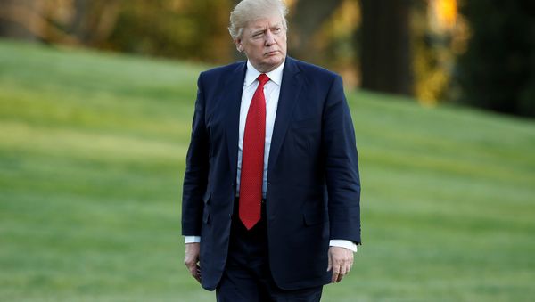 US President Donald Trump walks from Marine One upon his return to the White House in Washington, US, April 9, 2017. US President Donald Trump walks from Marine One upon his return to the White House in Washington, US, April 9, 2017. - Sputnik International