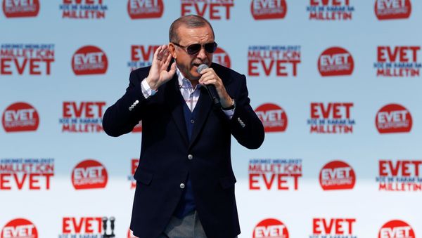 Turkish President Tayyip Erdogan addresses his supporters during a rally for the upcoming referendum, in Izmir, Turkey, April 9, 2017. - Sputnik International