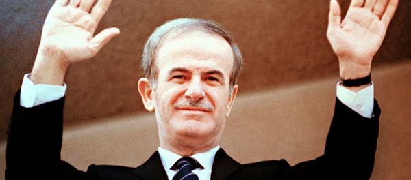 Photo dated 12 March 1985 of late Syrian President Hafez al-Assad acknowledging the crowd after beinb elected to a third seven-year term in front of parliament in Damascus - Sputnik International