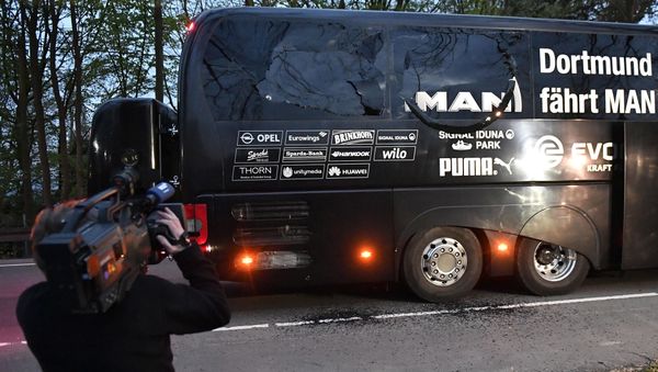 A camera man films Dortmund's team bus after it was damaged in an explosion before the Champions League quarterfinal soccer match between Borussia Dortmund and AS Monaco in Dortmund, western Germany, Tuesday, April 11, 2017. A camera man films Dortmund's team bus after it was damaged in an explosion before the Champions League quarterfinal soccer match between Borussia Dortmund and AS Monaco in Dortmund, western Germany, Tuesday, April 11, 2017. - Sputnik International