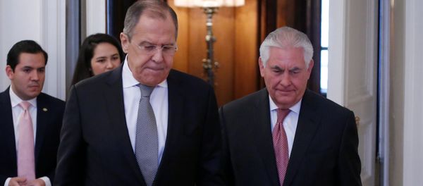 Russian Foreign Minister Sergei Lavrov and U.S. Secretary of State Rex Tillerson enter a hall during their meeting in Moscow, Russia, April 12, 2017 - Sputnik International