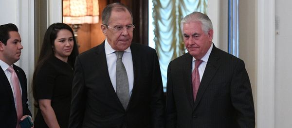 Russian Foreign Minister Sergei Lavrov and U.S. Secretary of State Rex Tillerson enter a hall during their meeting in Moscow, Russia, April 12, 2017 - Sputnik International