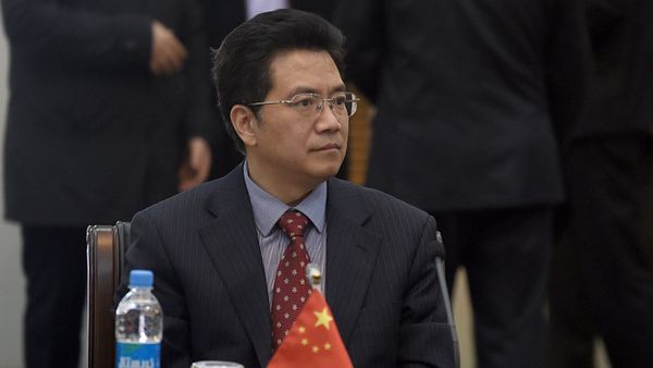 Chinese Special representative for Afghanistan, Deng Xijun listens to Afghan Foreign Minister, Salahuddin Rabbanion (unseen) as he chairs the second round of four-way peace talks meeting at the Presidential palace in Kabul on January 18, 2016 - Sputnik International