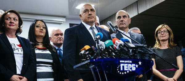 Head of the centre-right GERB party and former prime minister Boyko Borisov (C) speaks to media in Sofia on March 26, 2017, after his party won the country's parliamentary election Head of the centre-right GERB party and former prime minister Boyko Borisov (C) speaks to media in Sofia on March 26, 2017, after his party won the country's parliamentary election - Sputnik International