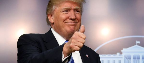 U.S. President Donald Trump gives a thumbs up as he hosts a CEO town hall on the American business climate at the Eisenhower Executive Office Building in Washington, U.S., April 4, 2017 - Sputnik International