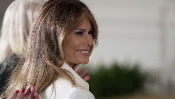 U.S. first lady Melania Trump smiles as she is recognized by President Donald Trump - Sputnik International