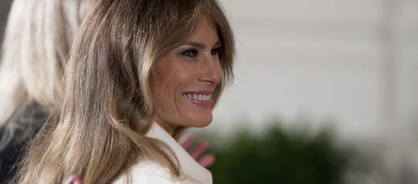 U.S. first lady Melania Trump smiles as she is recognized by President Donald Trump - Sputnik International