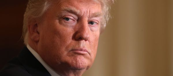 President Donald Trump listens during a news conference with NATO Secretary General Jens Stoltenberg in the East Room of the White House in Washington, Wednesday, April 12, 2017. President Donald Trump listens during a news conference with NATO Secretary General Jens Stoltenberg in the East Room of the White House in Washington, Wednesday, April 12, 2017. - Sputnik International