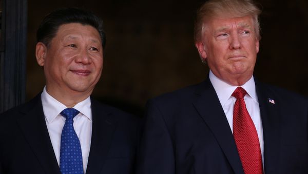 US President Donald Trump welcomes Chinese President Xi Jinping at Mar-a-Lago state in Palm Beach, Florida, US, April 6, 2017. US President Donald Trump welcomes Chinese President Xi Jinping at Mar-a-Lago state in Palm Beach, Florida, US, April 6, 2017. - Sputnik International