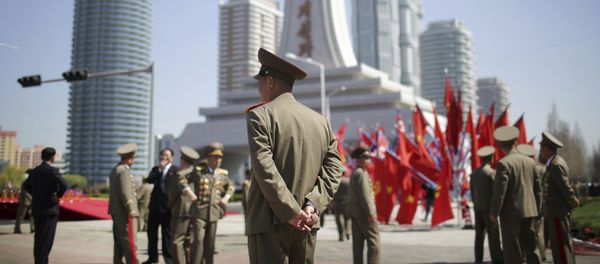 North Korean military soldiers walk along the Ryomyong residential area, a collection of more than a dozen apartment buildings just after attending its official opening ceremony on Thursday, April 13, 2017, in Pyongyang, North Korea. (AP Photo/Wong Maye-E) - Sputnik International