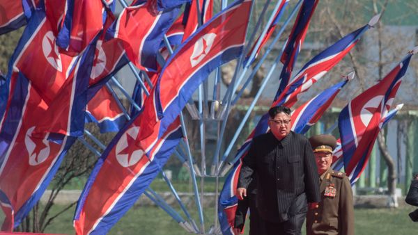 DPRK leader Kim Jong-il, center, at a ceremony to open a new residential area on Ryomyong Street in Pyongyang. - Sputnik International