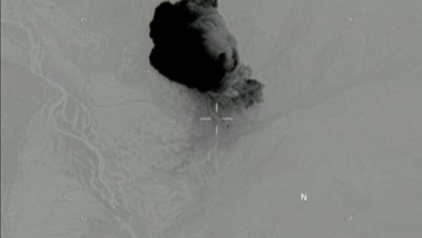 Still image taken from a video released by the U.S. Department of Defense on April 14, 2017 shows the moment the mother of all bombs struck the Achin district of the eastern province of Nangarhar, Afghanistan Still image taken from a video released by the U.S. Department of Defense on April 14, 2017 shows the moment the mother of all bombs struck the Achin district of the eastern province of Nangarhar, Afghanistan - Sputnik International