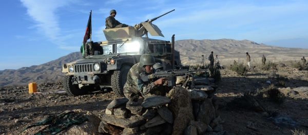 In this photograph taken on December 3, 2016, Afghan security forces take positions following an operation against DAESH militants in Pachir Wa Agam district of Nangarhar province. In this photograph taken on December 3, 2016, Afghan security forces take positions following an operation against DAESH militants in Pachir Wa Agam district of Nangarhar province. - Sputnik International