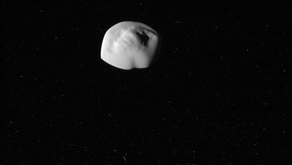 Atlas, the flying saucer moon of Saturn. Photo taken by NASA's Cassini Probe. Atlas, the flying saucer moon of Saturn. Photo taken by NASA's Cassini Probe. - Sputnik International