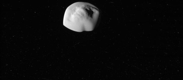 Atlas, the flying saucer moon of Saturn. Photo taken by NASA's Cassini Probe. Atlas, the flying saucer moon of Saturn. Photo taken by NASA's Cassini Probe. - Sputnik International