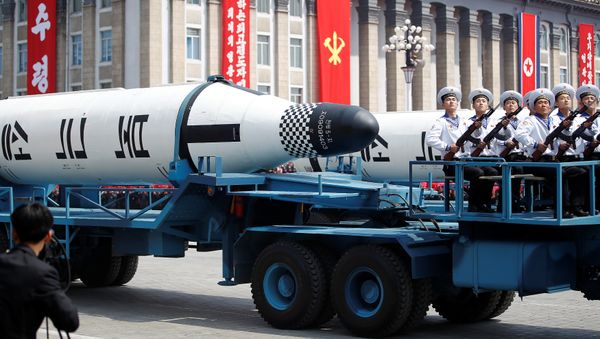 Military vehicles carry missiles with characters reading 'Pukkuksong' during a military parade marking the 105th birth anniversary of country's founding father, Kim Il Sung in Pyongyang, North Korea April 15, 2017. - Sputnik International