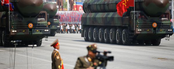 Missiles are driven past the stand with North Korean leader Kim Jong Un and other high ranking officials during a military parade marking the 105th birth anniversary of country's founding father Kim Il Sung, in Pyongyang April 15, 2017 - Sputnik International