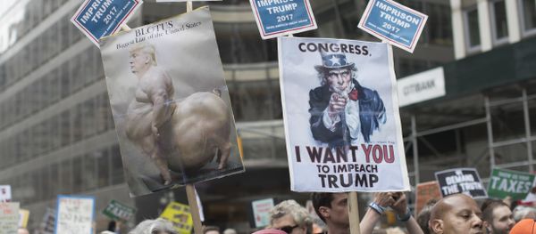 Demonstrators participate in a march and rally to demand President Donald Trump release his tax returns, Saturday, April 15, 2017, in New York - Sputnik International