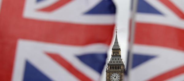 British Union flags displayed on a tourist stall, backdropped by the Elizabeth Tower at the Houses of Parliament, in central London, Wednesday, March 29, 2017. British Union flags displayed on a tourist stall, backdropped by the Elizabeth Tower at the Houses of Parliament, in central London, Wednesday, March 29, 2017. - Sputnik International