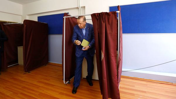 Turkish President Tayyip Erdogan leaves a voting booth at a polling station during a referendum in Istanbul, Turkey, April 16, 2017. Turkish President Tayyip Erdogan leaves a voting booth at a polling station during a referendum in Istanbul, Turkey, April 16, 2017. - Sputnik International