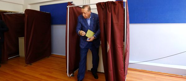 Turkish President Tayyip Erdogan leaves a voting booth at a polling station during a referendum in Istanbul, Turkey, April 16, 2017. Turkish President Tayyip Erdogan leaves a voting booth at a polling station during a referendum in Istanbul, Turkey, April 16, 2017. - Sputnik International