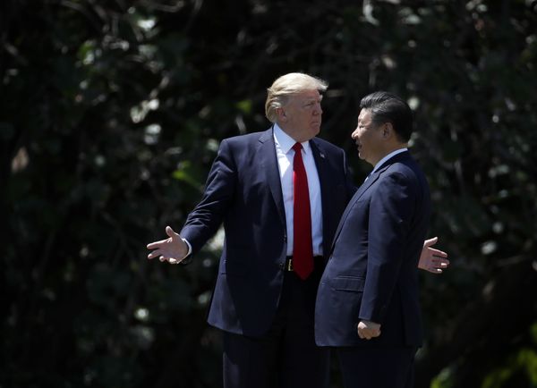 President Donald Trump gestures as he and Chinese President Xi Jinping walk together after their meetings at Mar-a-Lago in Palm Beach, Fla President Donald Trump gestures as he and Chinese President Xi Jinping walk together after their meetings at Mar-a-Lago in Palm Beach, Fla - Sputnik International