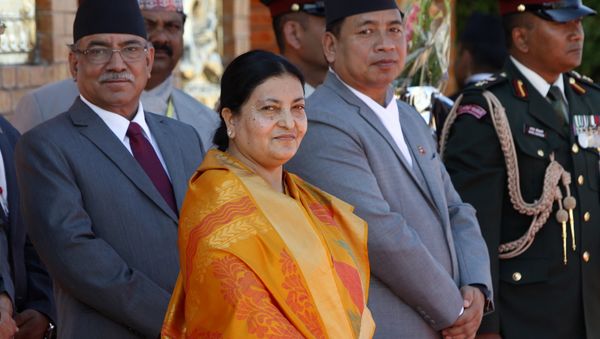 Nepalese president Bidhya Devi Bhandari, (2L), Vice President Nanda Kishor Pun, (2R), and Prime minister Pushpakamal Dahal (L) wait to receive Indian President Pranab Mukherjee on his arrival at Tribhuvan International Airport in Kathmandu on November 2, 2016 Nepalese president Bidhya Devi Bhandari, (2L), Vice President Nanda Kishor Pun, (2R), and Prime minister Pushpakamal Dahal (L) wait to receive Indian President Pranab Mukherjee on his arrival at Tribhuvan International Airport in Kathmandu on November 2, 2016 - Sputnik International