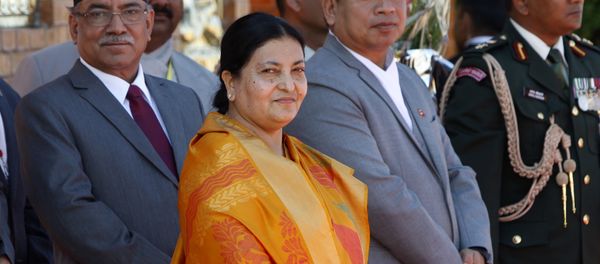 Nepalese president Bidhya Devi Bhandari, (2L), Vice President Nanda Kishor Pun, (2R), and Prime minister Pushpakamal Dahal (L) wait to receive Indian President Pranab Mukherjee on his arrival at Tribhuvan International Airport in Kathmandu on November 2, 2016 - Sputnik International