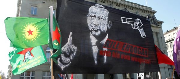 People hold banners and flags during a demonstration against Erdogan dictatorship and in favour of democracy in Turkey, in Bern, Switzerland March 25, 2017 - Sputnik International