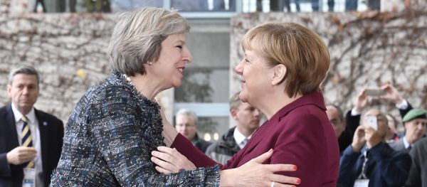 German Chancellor Angela Merkel (R) welcomes British Prime Minister Theresa May as she arrives for a meeting of the US President with European leaders on November 18, 2016 at the Chancellery in Berlin German Chancellor Angela Merkel (R) welcomes British Prime Minister Theresa May as she arrives for a meeting of the US President with European leaders on November 18, 2016 at the Chancellery in Berlin - Sputnik International