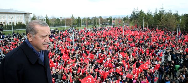 Turkish President Tayyip Erdogan addresses his supporters upon his arrival at Esenboga Airport in Ankara, Turkey, April 17, 2017. - Sputnik International