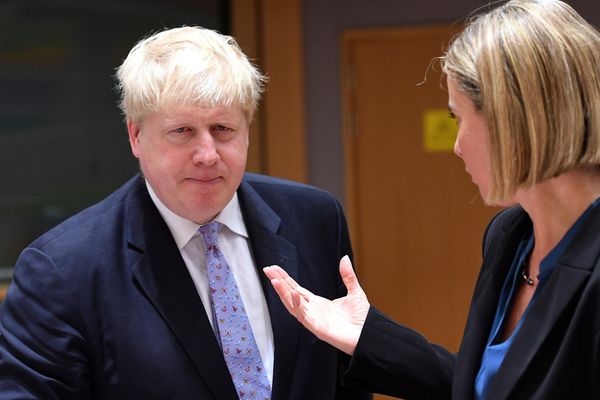 British foreign minister Boris Johnson (L) listens to EU foreign policy chief Federica Mogherini during an EU foreign ministers meeting at the European Council, in Brussels, on January 16, 2017 - Sputnik International