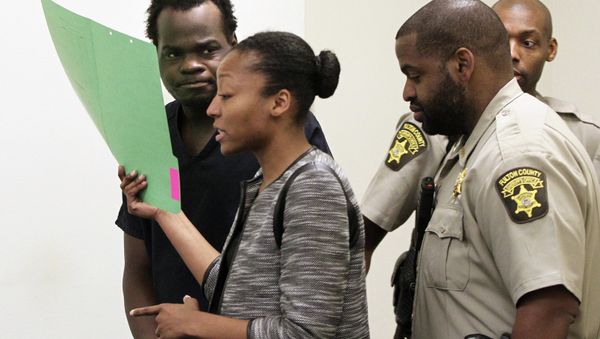 Basil Eleby is escorted by his public defender and two Fulton County Sheriff's office officers into the court room at the Fulton County Jail in Atlanta on Saturday, April 1, 2017. Eleby, accused of starting a raging fire that collapsed a portion of Interstate 85 a few miles north of downtown Atlanta was charged with arson. Basil Eleby is escorted by his public defender and two Fulton County Sheriff's office officers into the court room at the Fulton County Jail in Atlanta on Saturday, April 1, 2017. Eleby, accused of starting a raging fire that collapsed a portion of Interstate 85 a few miles north of downtown Atlanta was charged with arson. - Sputnik International