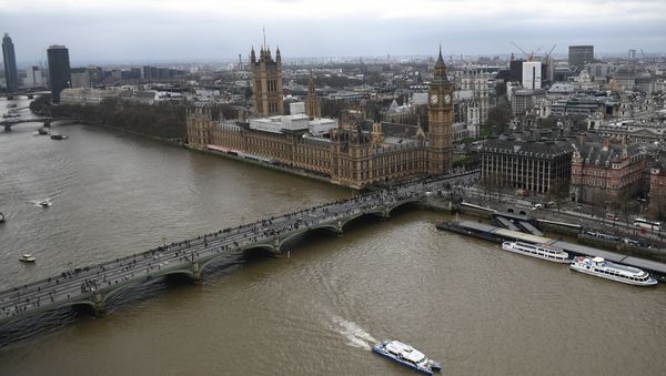 The Palace of Westminster, comprising the House of Commons and the House of Lords, wchich together make up the Houses of Parliament, are pictured on the banks of the River Thames alongside Westminster Bridge in central London on March 29, 2017 The Palace of Westminster, comprising the House of Commons and the House of Lords, wchich together make up the Houses of Parliament, are pictured on the banks of the River Thames alongside Westminster Bridge in central London on March 29, 2017 - Sputnik International