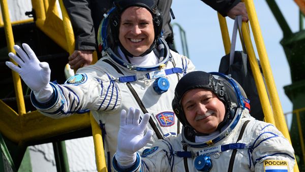 Roscosmos cosmonaut Fyodor Yurchikhin and NASA astronaut Jack Fischer - Sputnik International