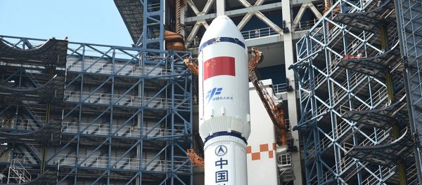 Long March-7 rocket and Tianzhou-1 cargo spacecraft are seen as they are transferred to a launching spot in Wenchang, Hainan province, China, April 17, 2017 Long March-7 rocket and Tianzhou-1 cargo spacecraft are seen as they are transferred to a launching spot in Wenchang, Hainan province, China, April 17, 2017 - Sputnik International