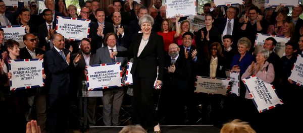 Britain's Prime Minister Theresa May delivers a speech to Conservative Party members to launch their election campaign in Walmsley Parish Hall, Bolton, Britain April 19, 2017 Britain's Prime Minister Theresa May delivers a speech to Conservative Party members to launch their election campaign in Walmsley Parish Hall, Bolton, Britain April 19, 2017 - Sputnik International